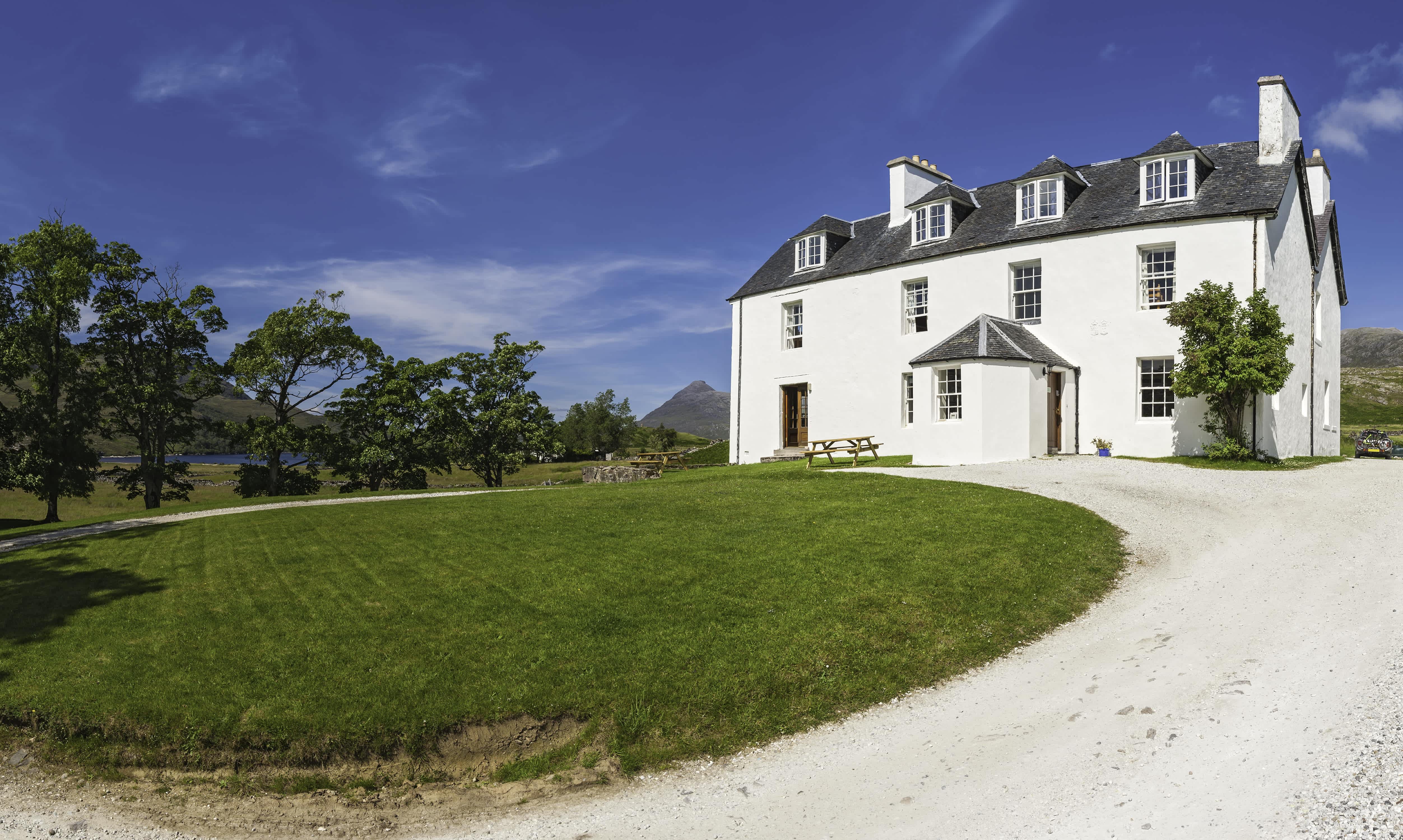Circular driveway in front of country home