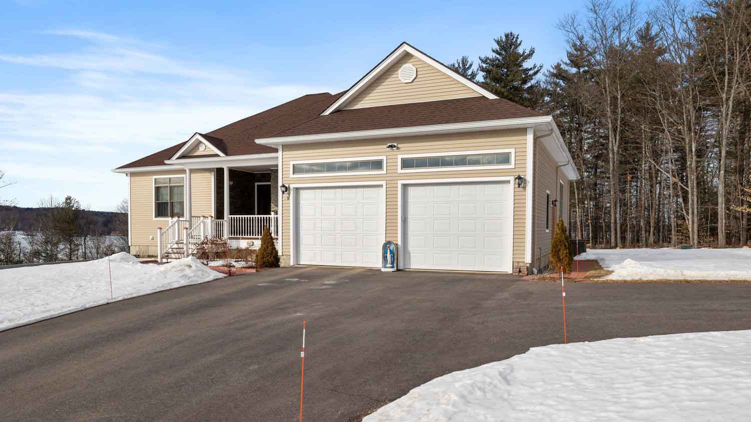 A heated driveway in a modern house with two garages