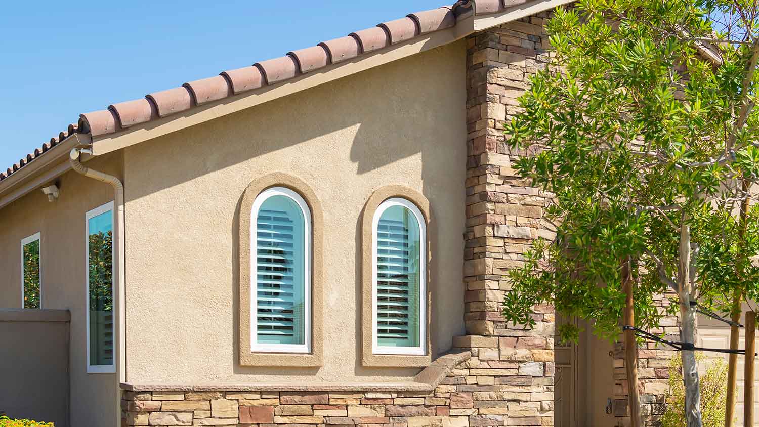 Detail of a house with stucco exterior walls