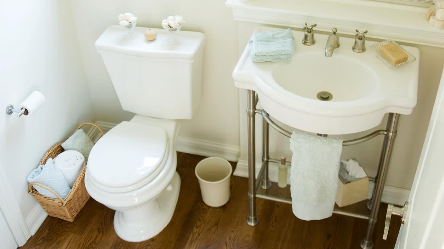 A half-bath with a pedestal sink