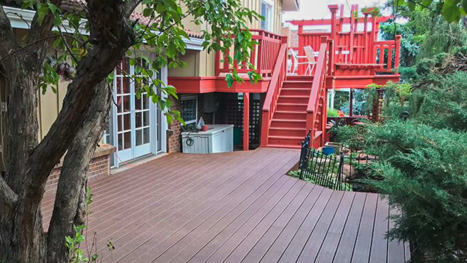 House with deck and red stairs