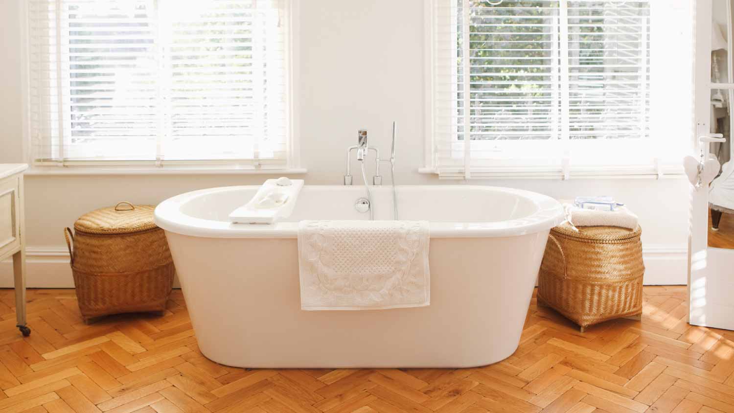 White modern bathroom with bathtub