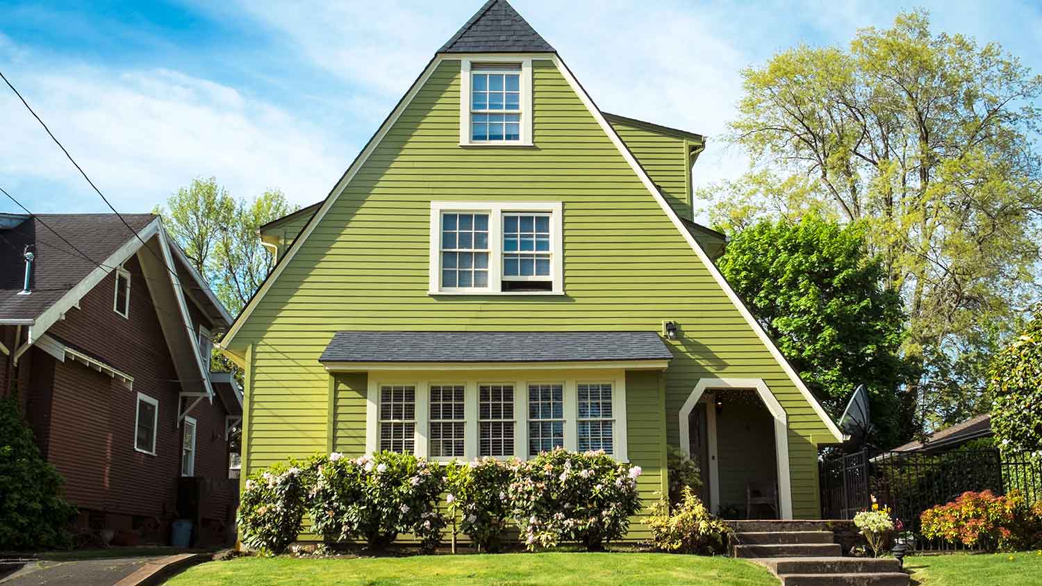 A-frame house exterior with clapboard siding