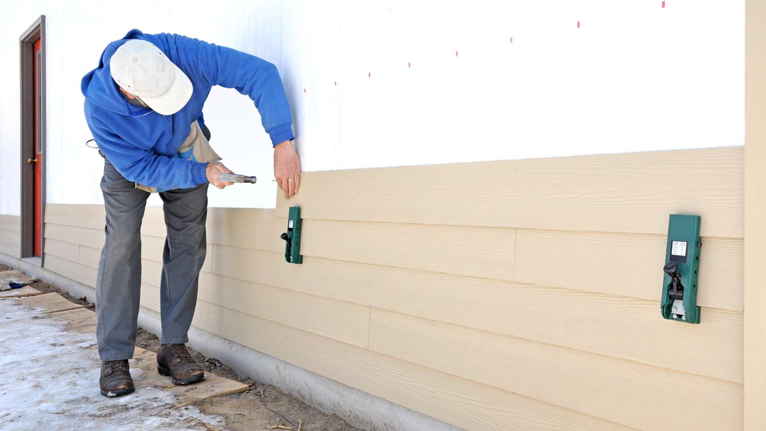 Man installing siding