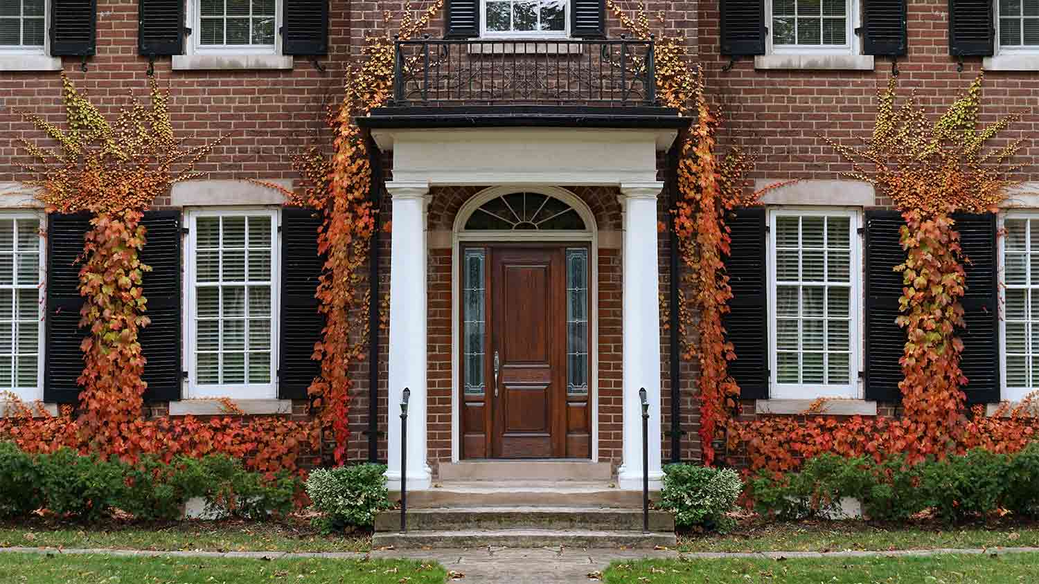 brick two story home with lintel