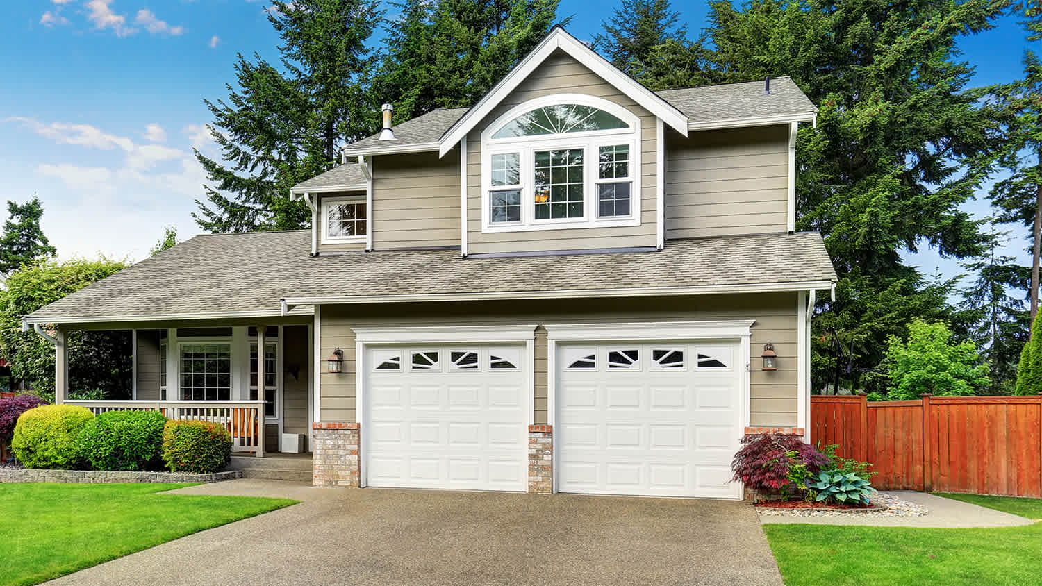 grey house exterior with lawn