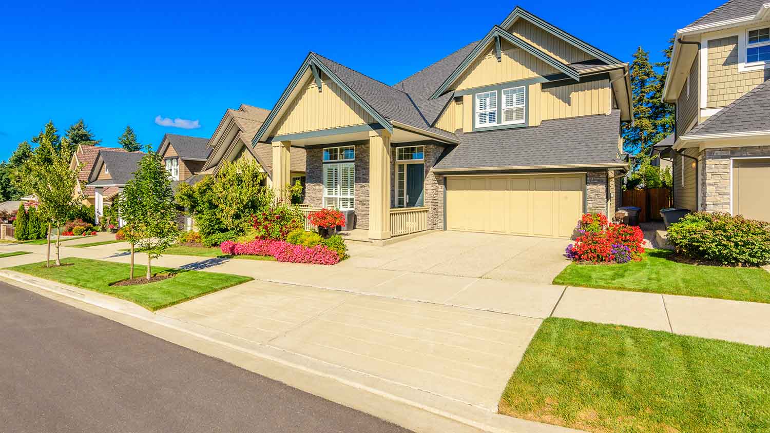 Suburban house with concrete driveway apron