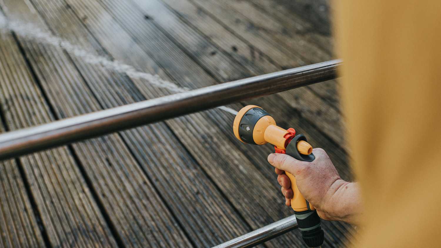 Power hose wooden deck