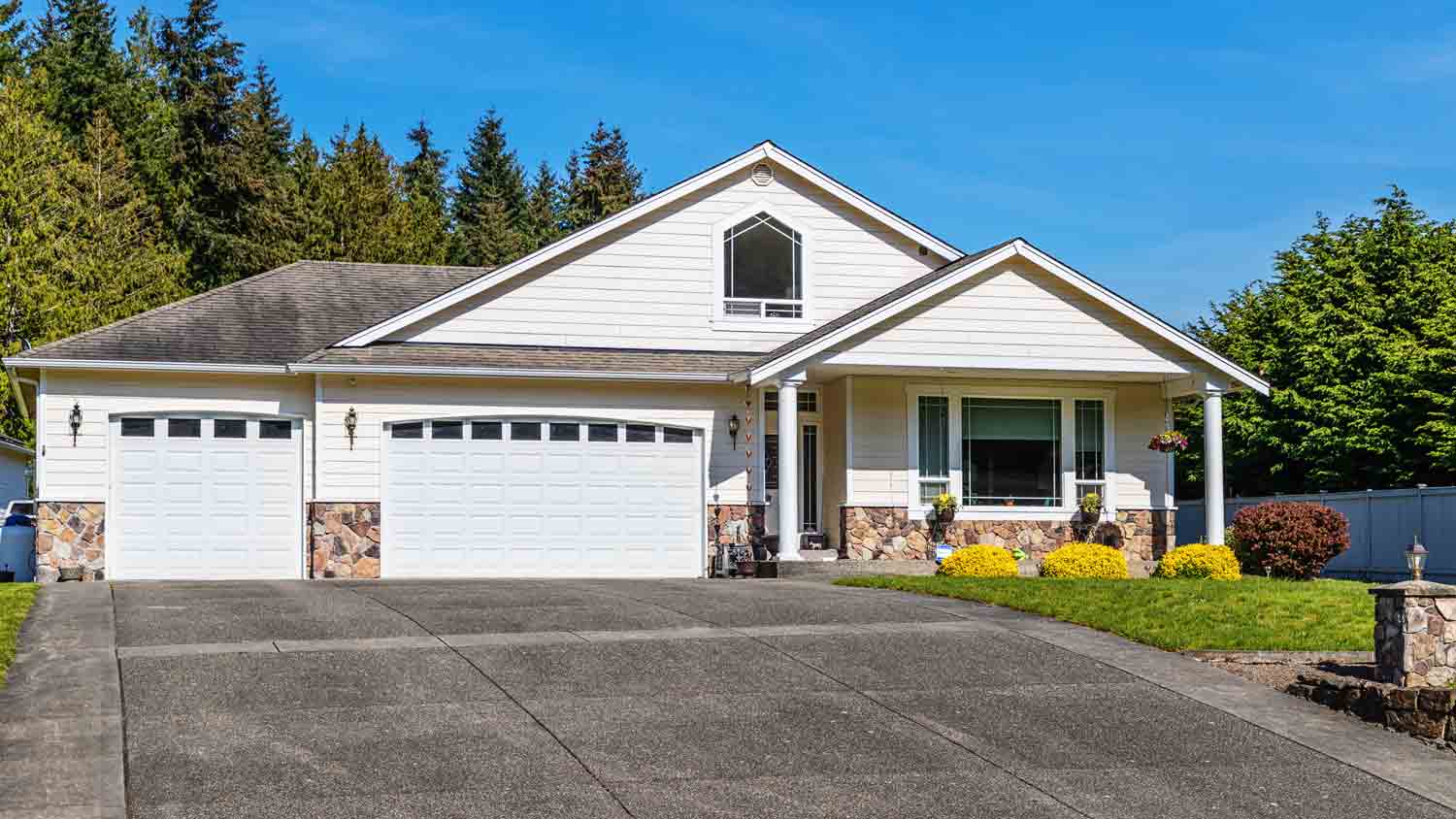 suburban home with large driveway