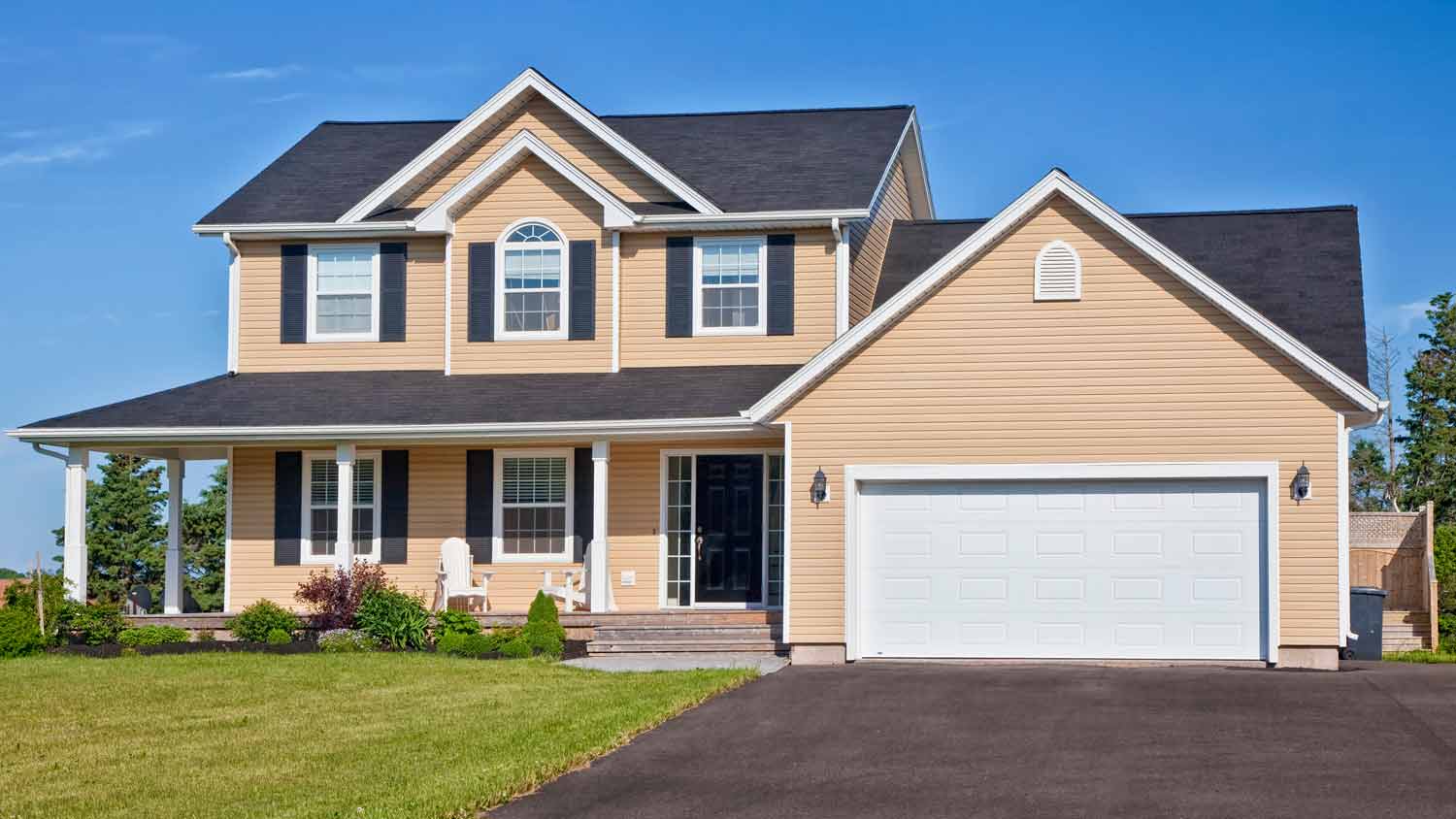 yellow modern country house with vinyl siding