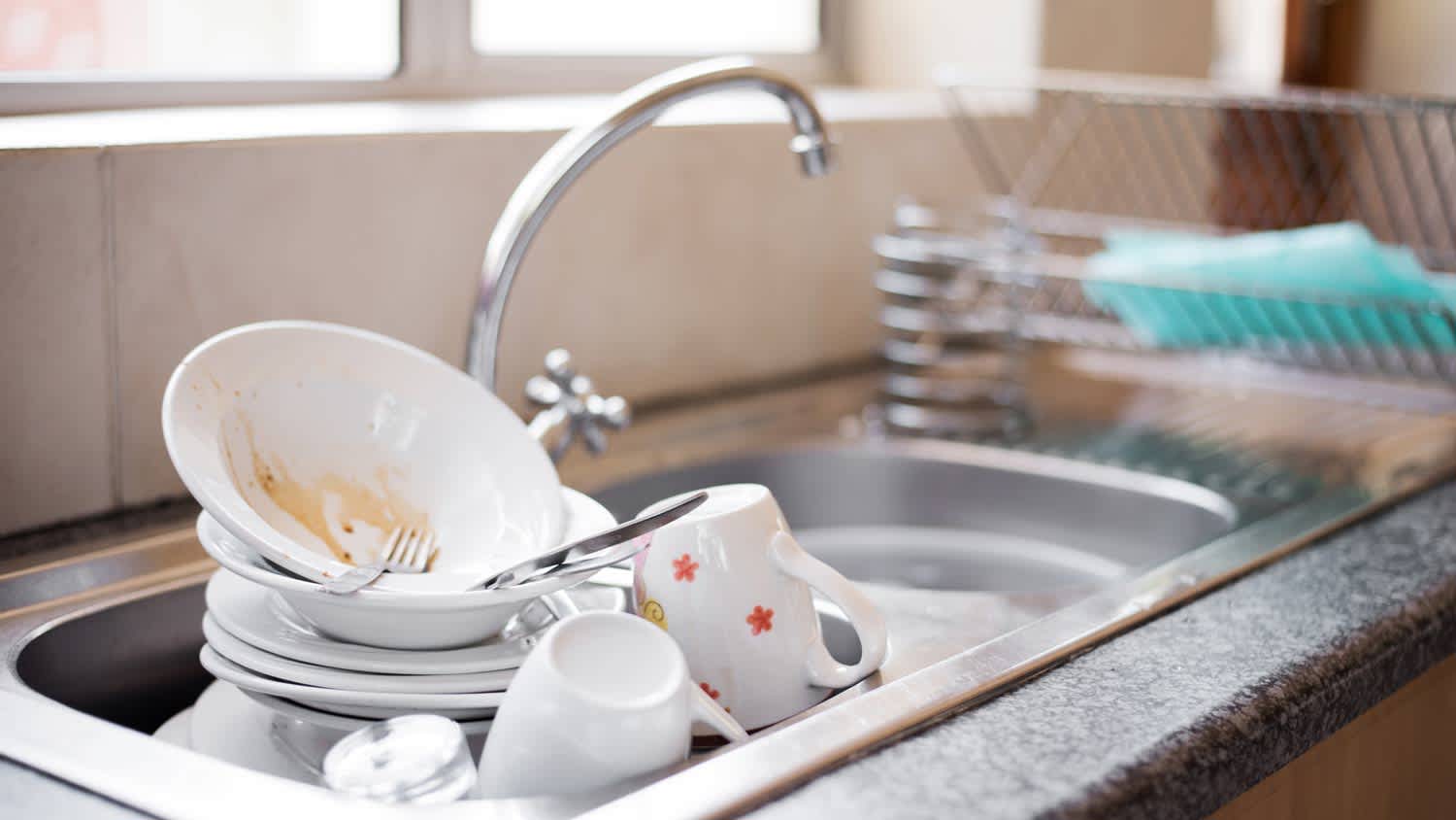 sink full of dirty dishes