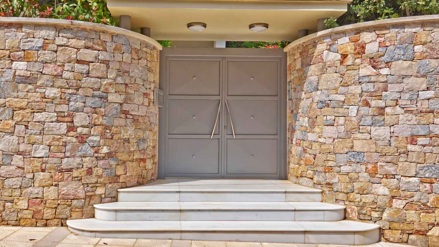 A gray metal entrance door