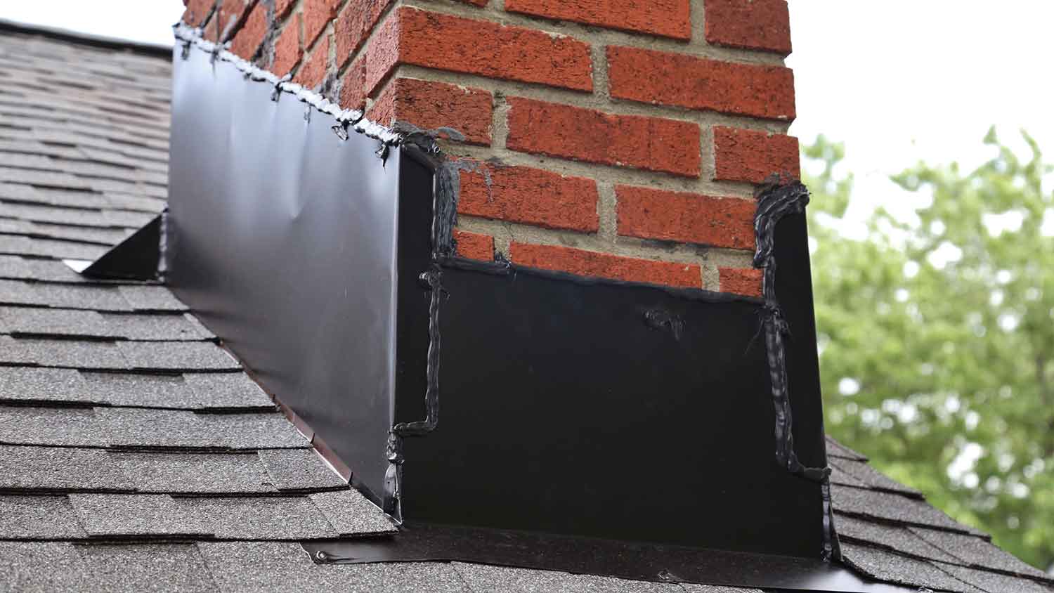 Brick chimney with counter flashing