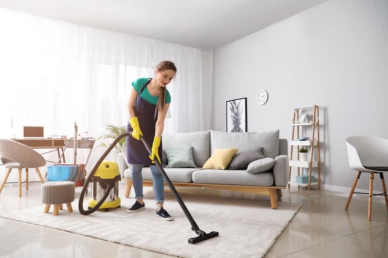 Woman cleaning house