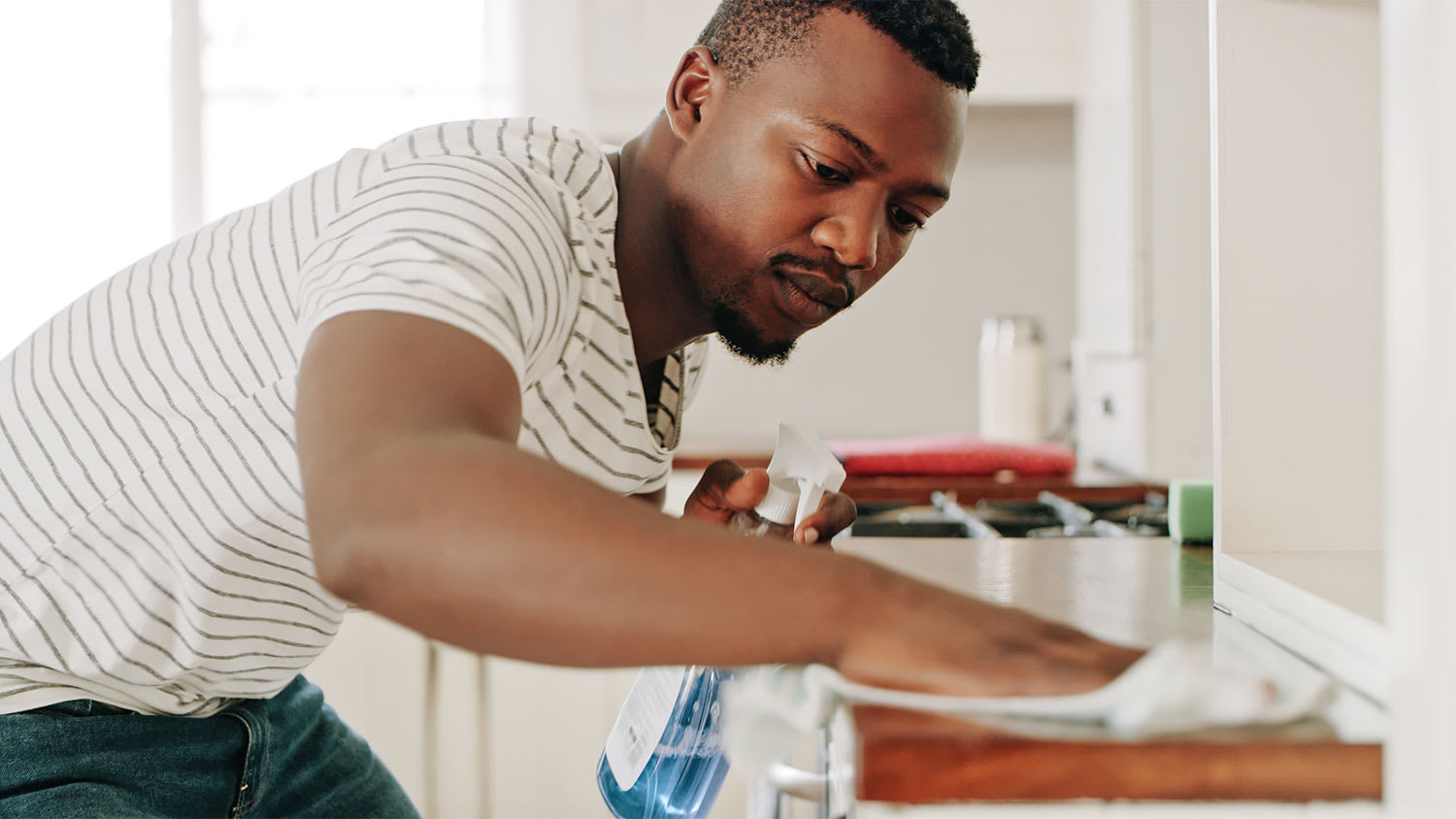 A man cleans his home
