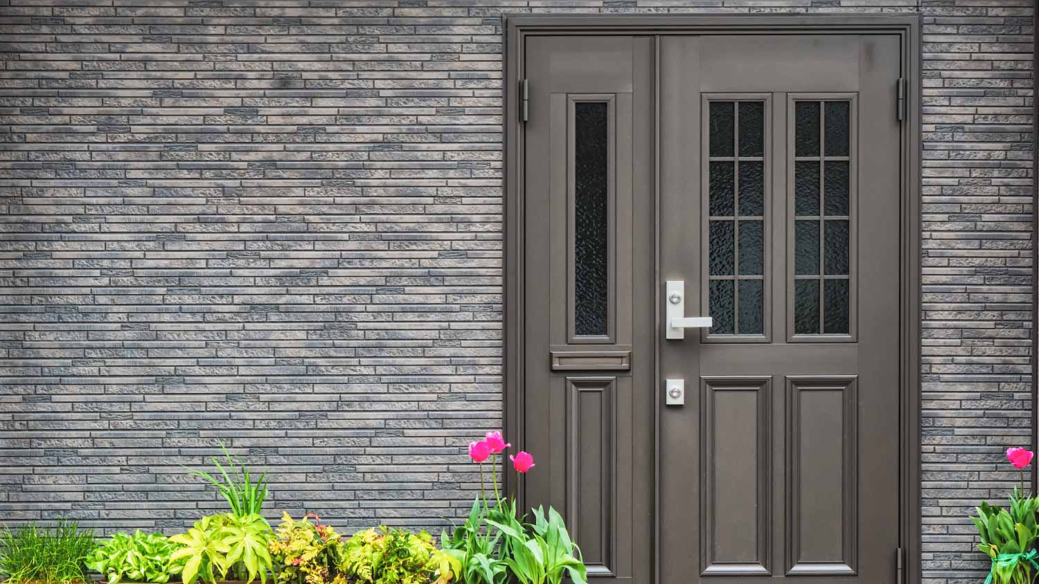 White house with gray front door, including different tones of gray paint