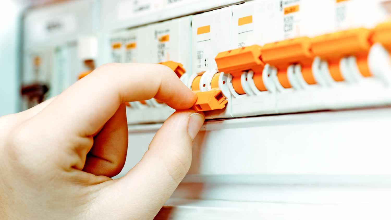 Woman turning off the power