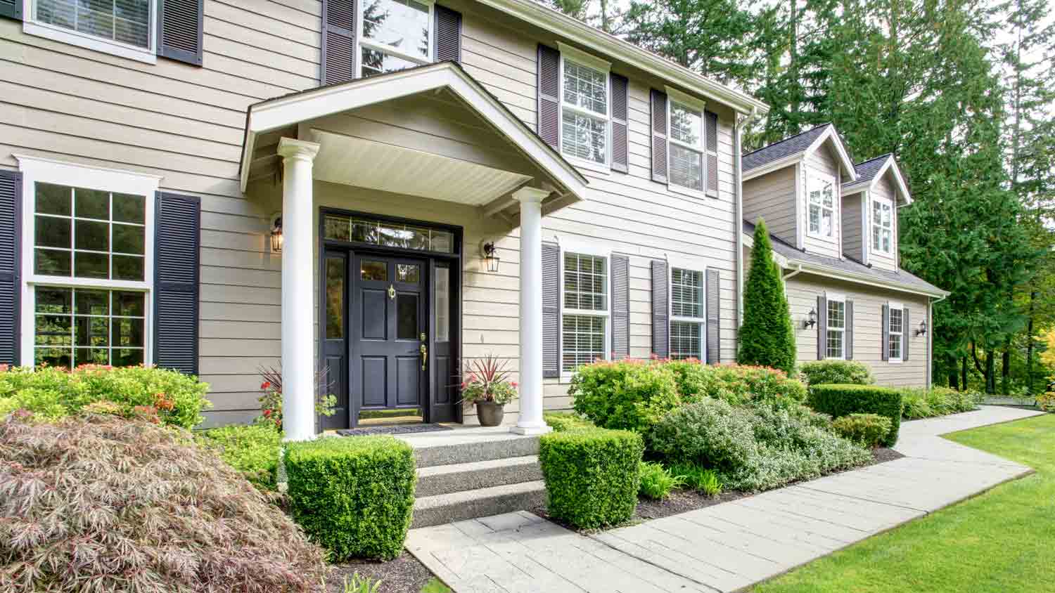 large beige classic house