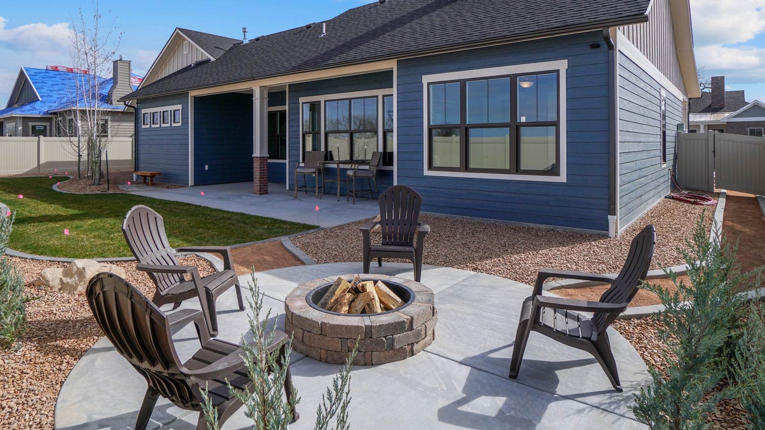 Modern Backyard Firepit with Patio Furniture