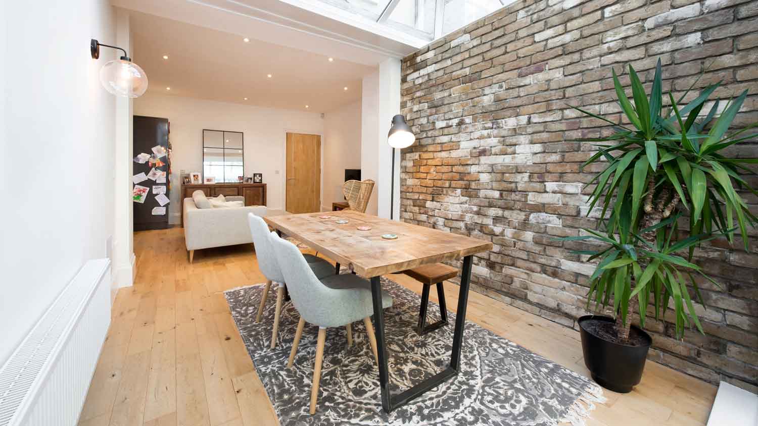 Interior shot of a dining room with german smear on an accent wall