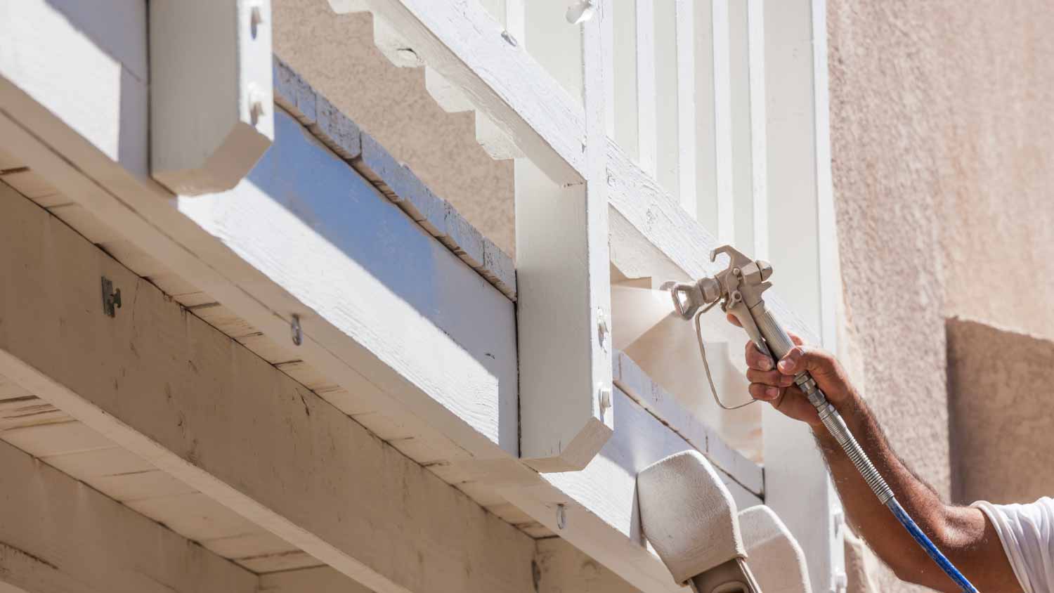 Man painting deck