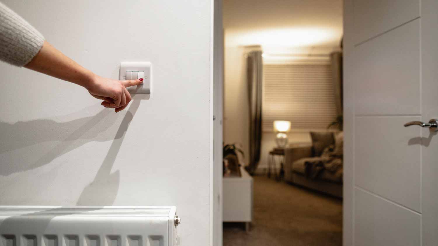 Woman turning lights off
