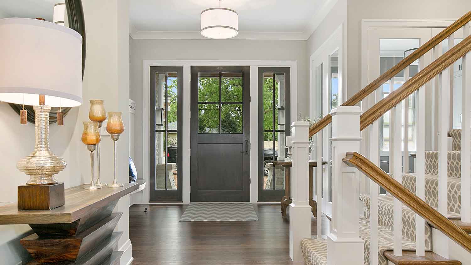 entrance hallway with lights on