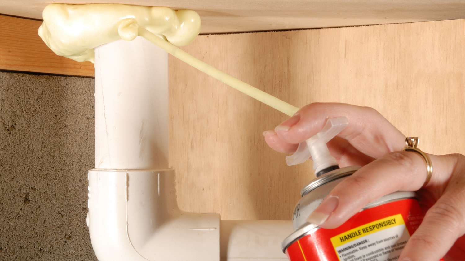 Foam Spray around pipe