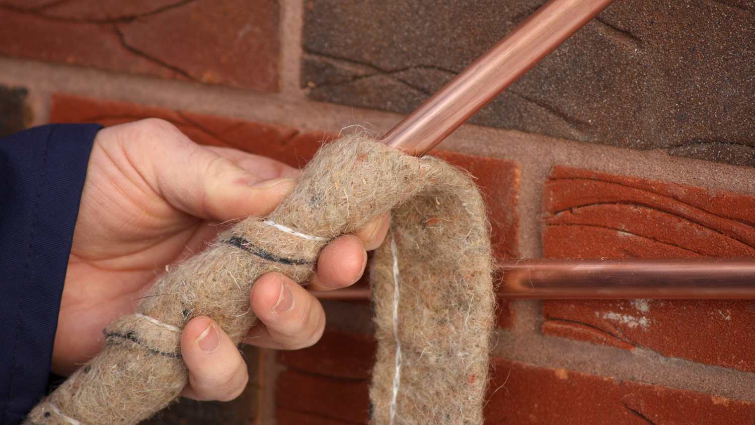 Wool insulation on copper pipe