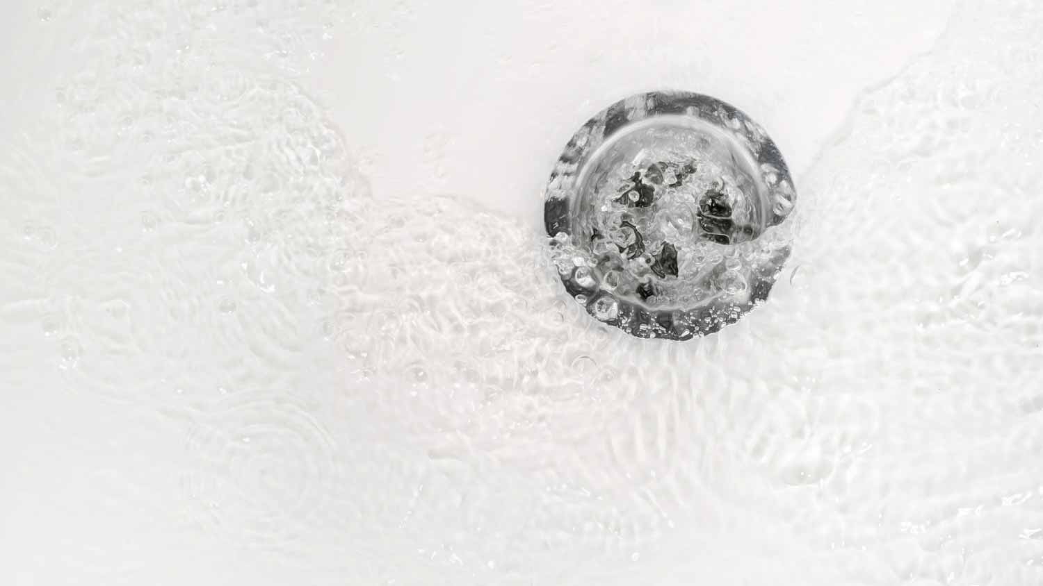 White bathroom sink drain
