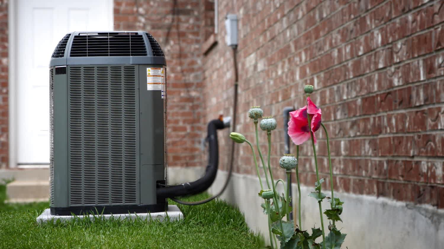 An AC on house backyard