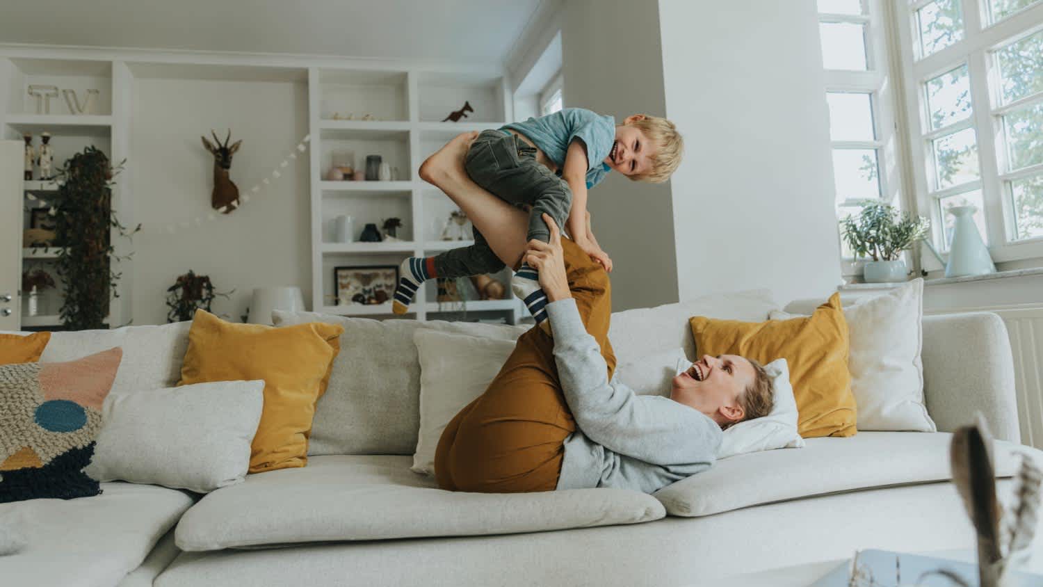 Mom and son playing in the living room
