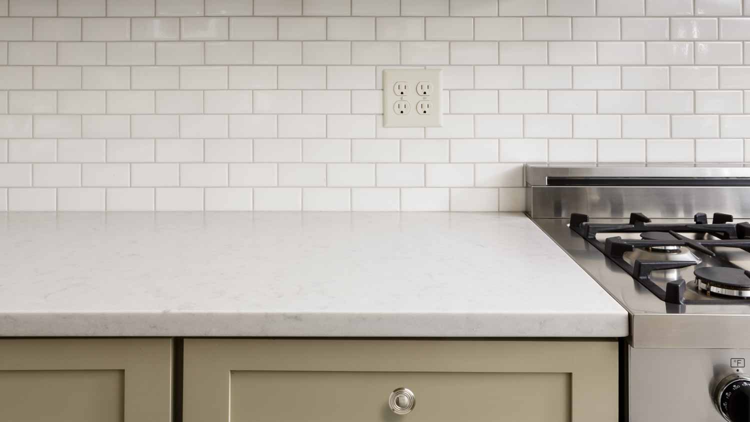 Kitchen counter with white tiles