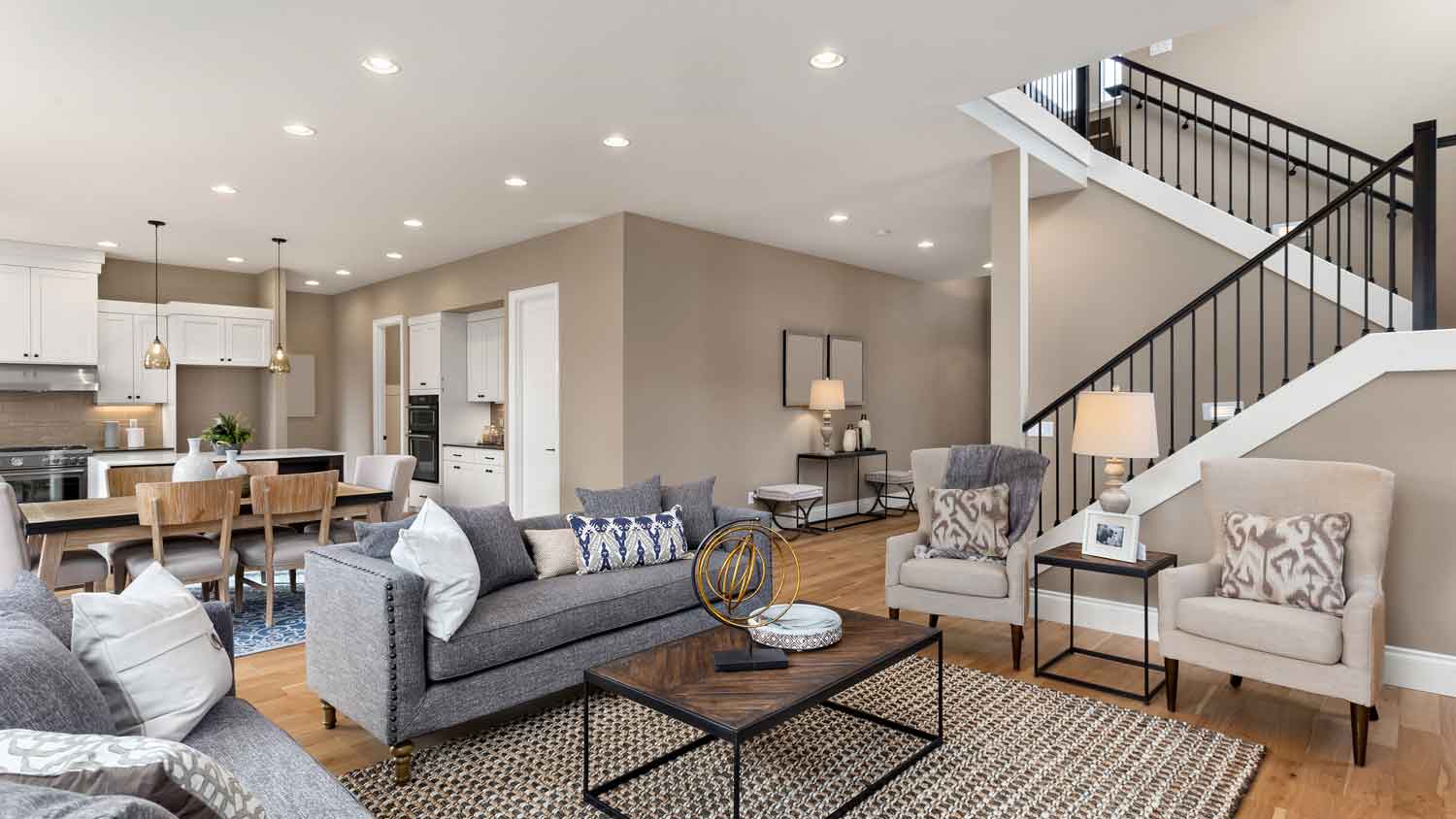 A living room with an open space kitchen