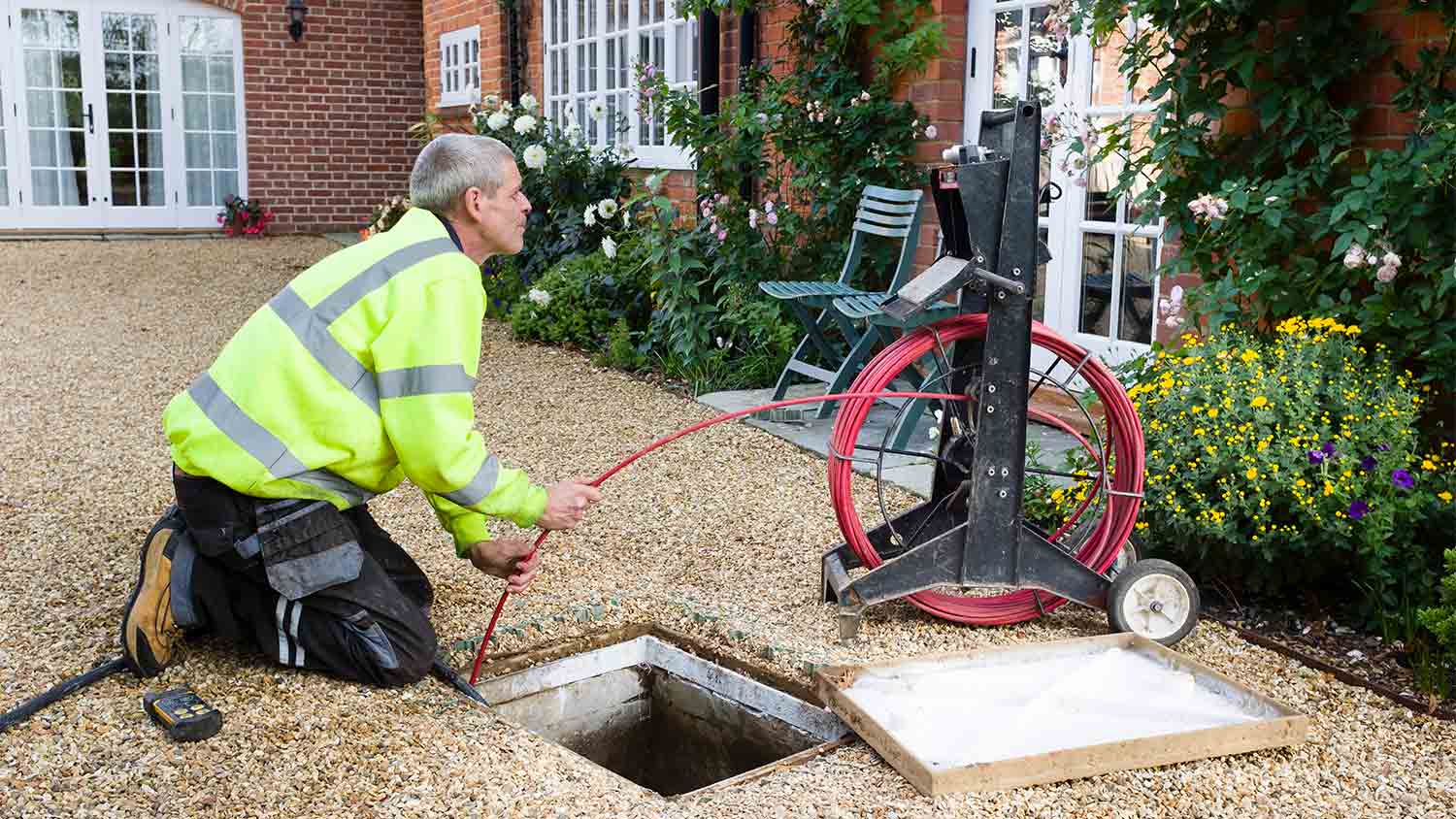 professional cleaning out drain in home