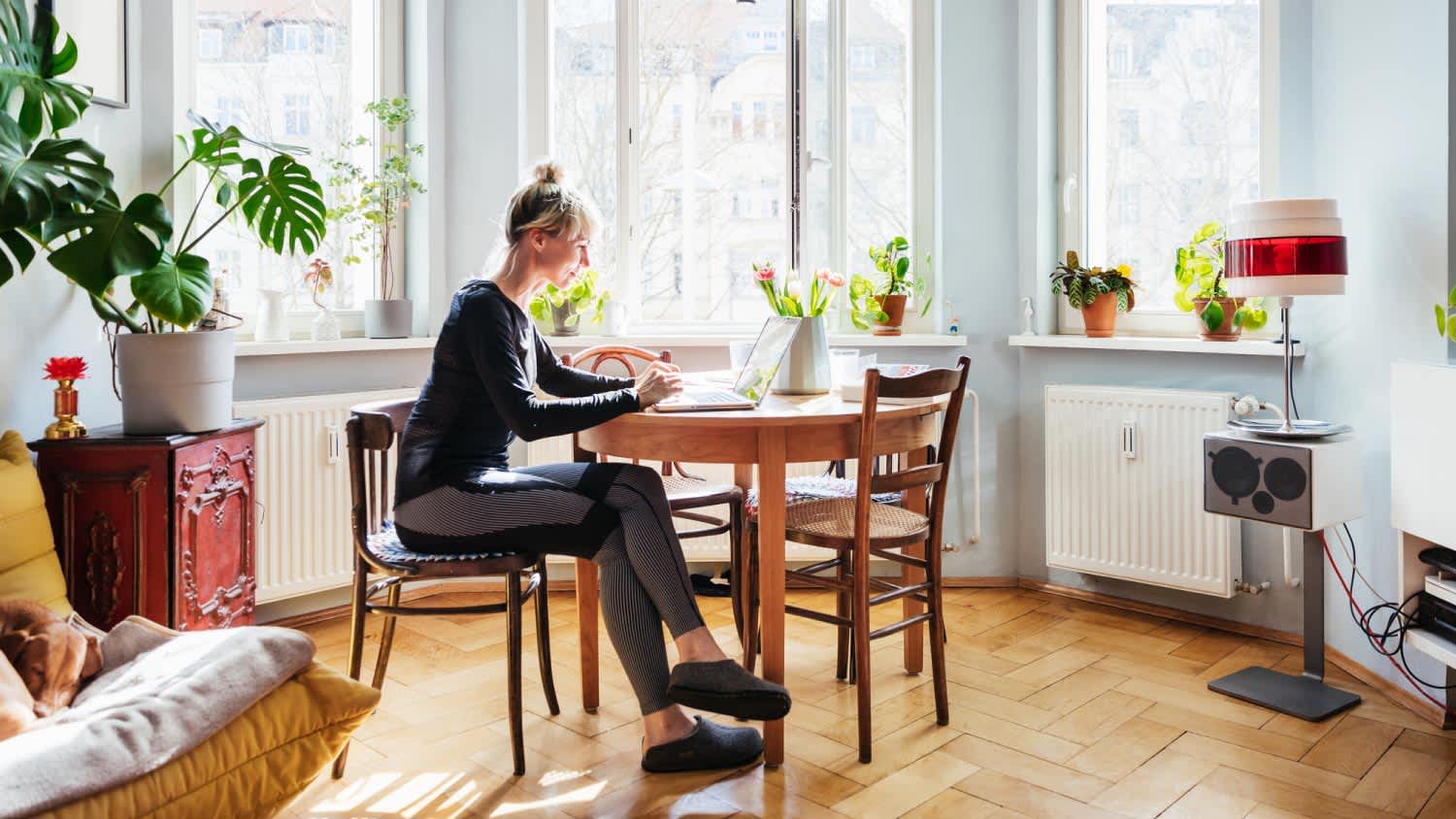 A woman sitting in the living room