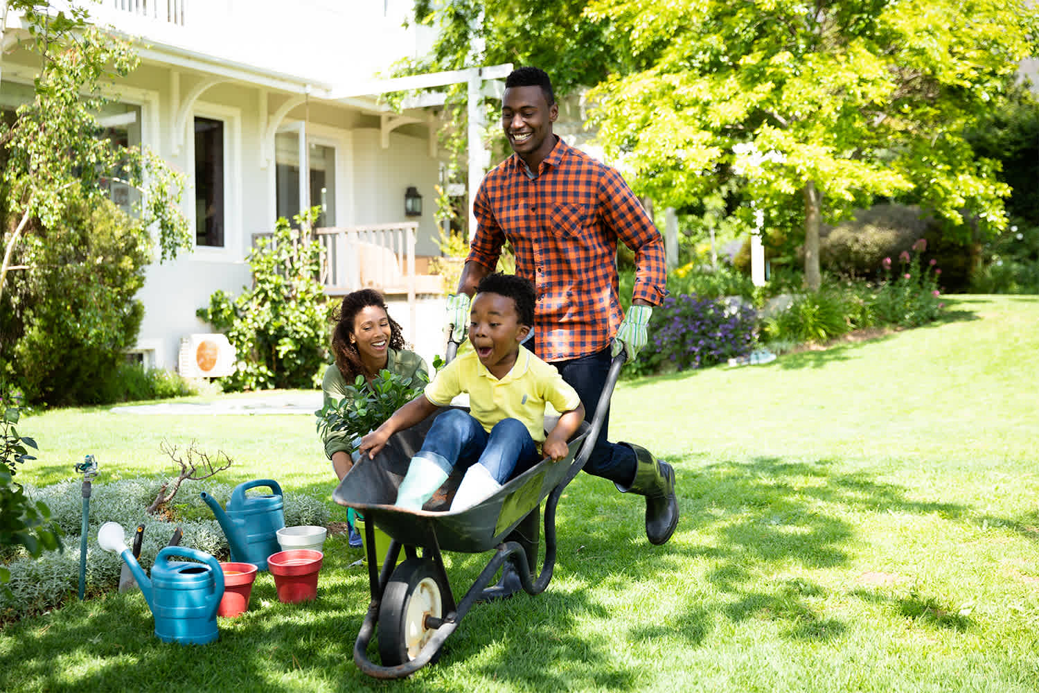 Family in yard of their home
