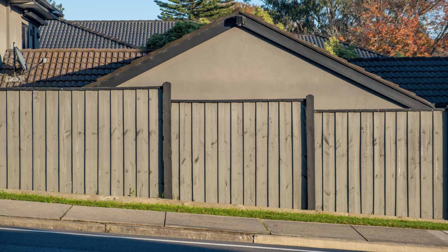 Slanted street with fence