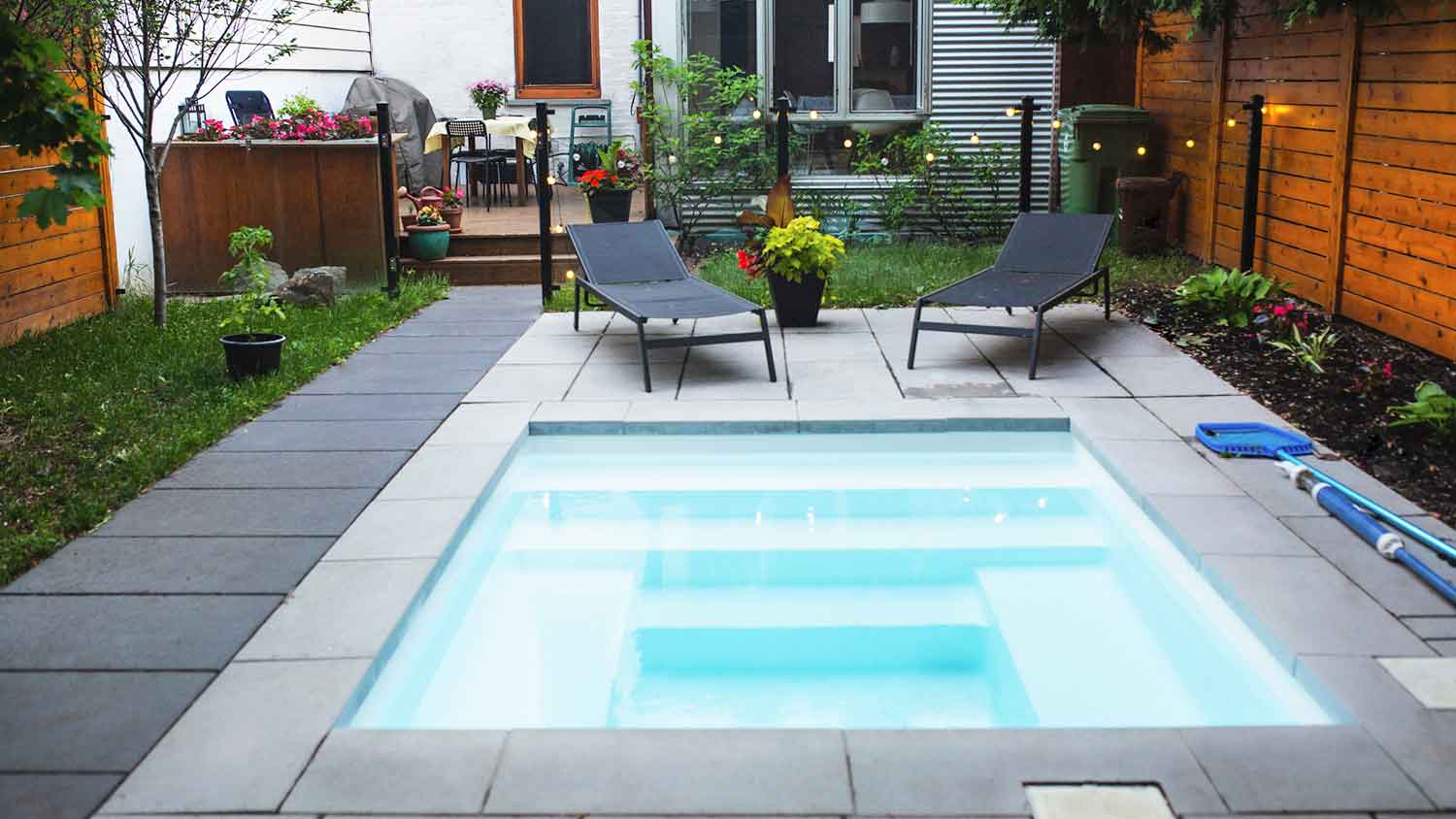 Plunge pool in a small cozy backyard