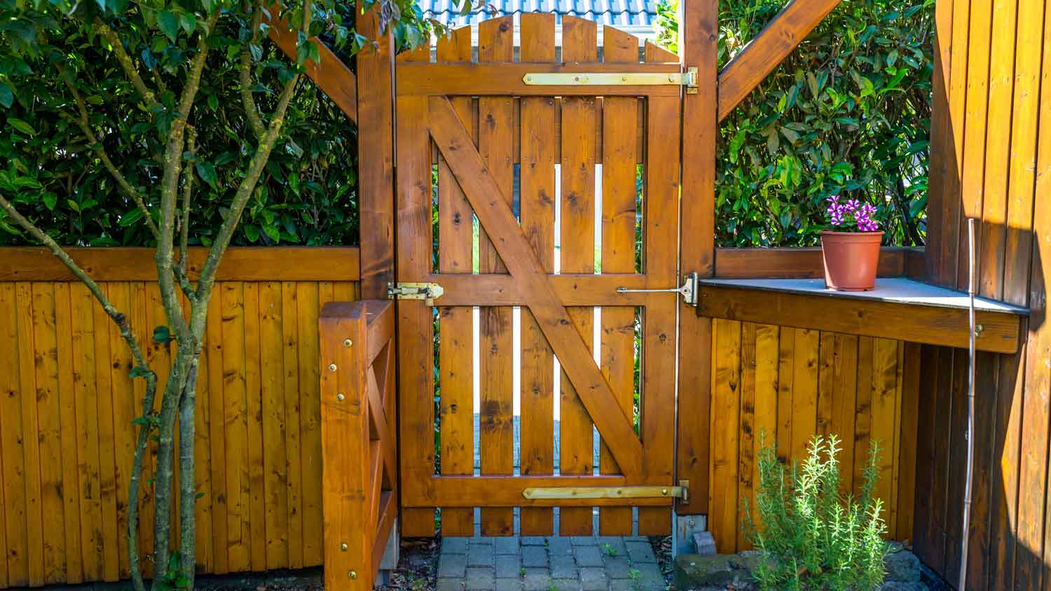 A wooden gate with a latch