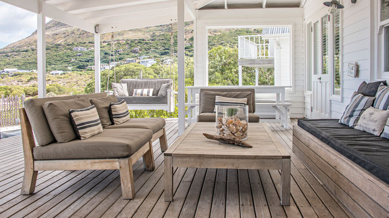 covered wooden deck outdoor furniture