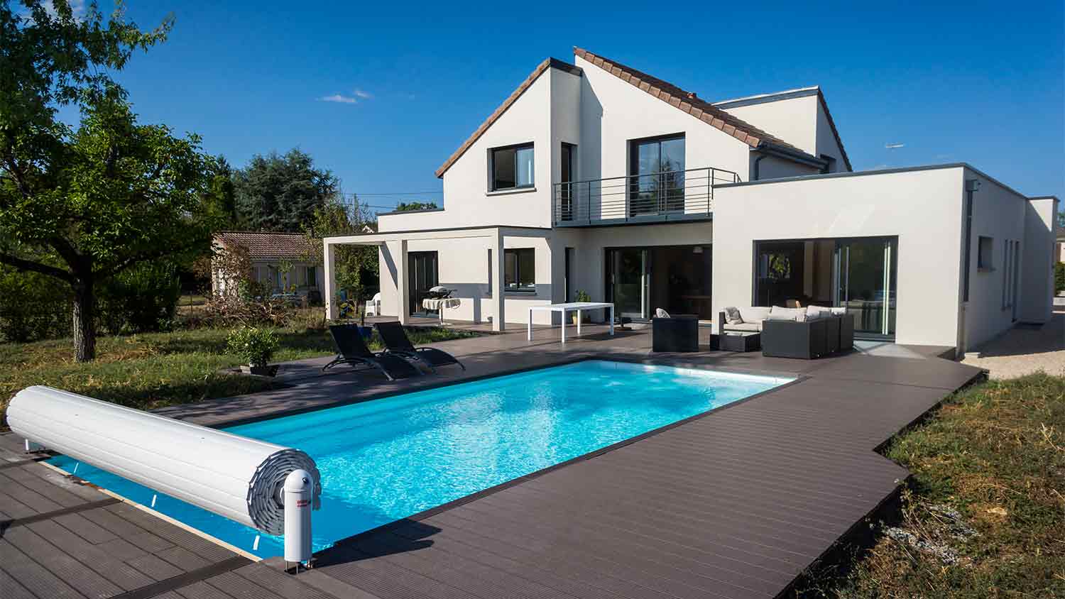 large white house with inground pool