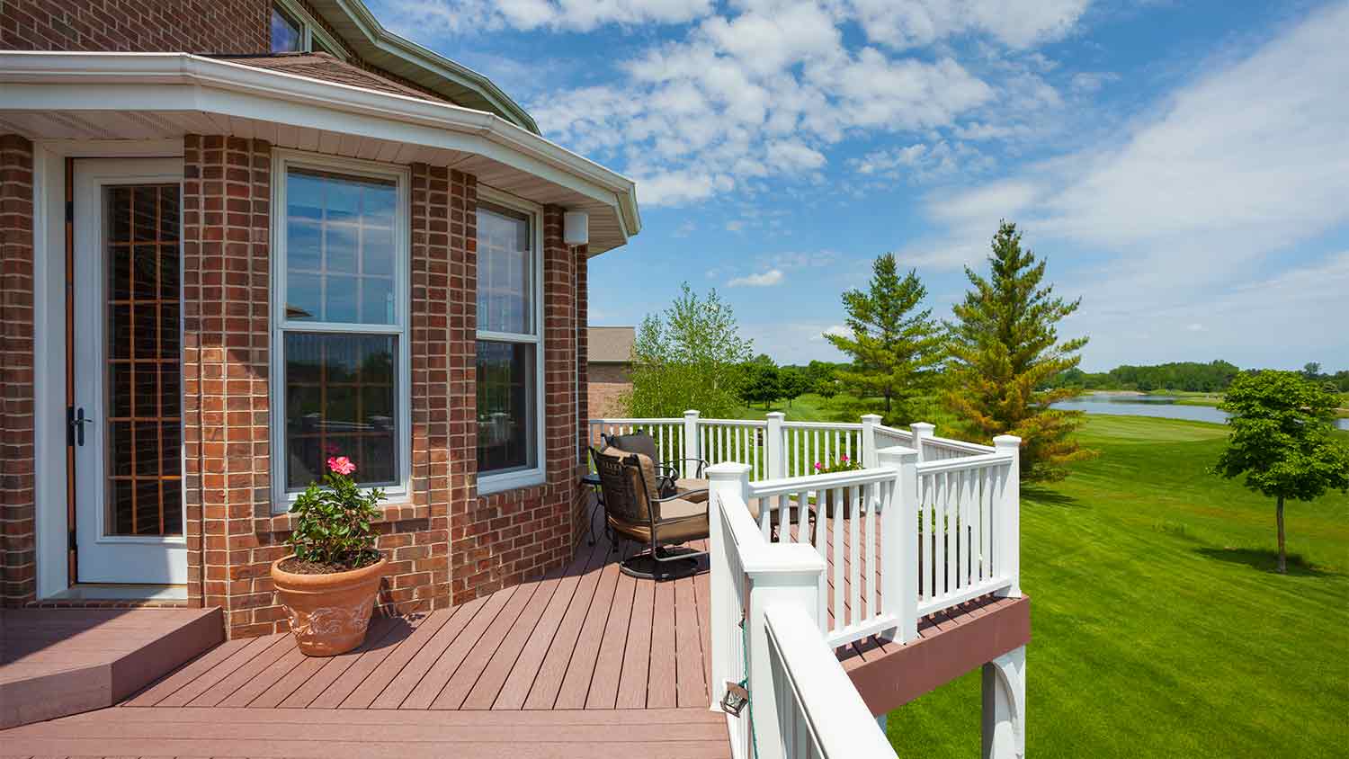 house with beautiful deck with a view