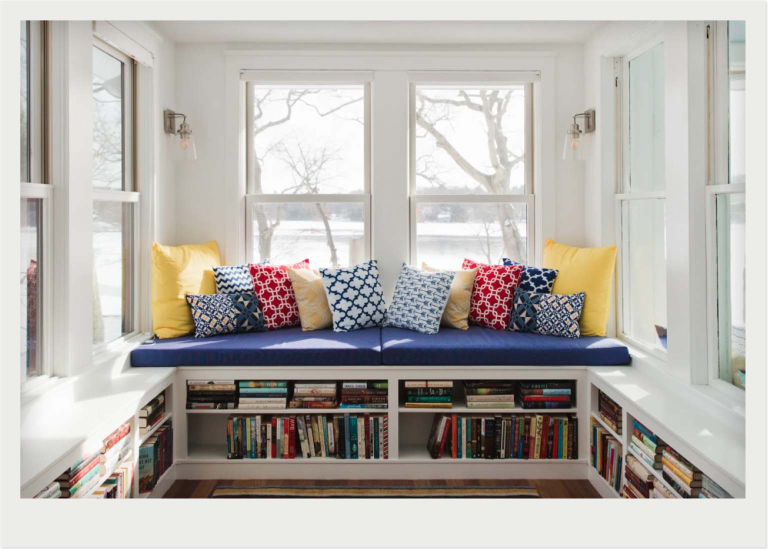 sunroom with mini library in bench