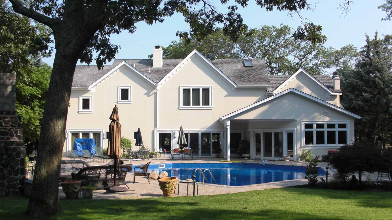 Pool in the backyard of large house