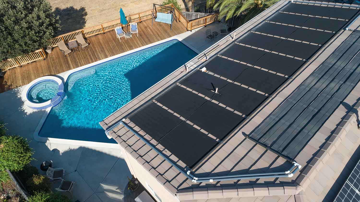 Swimming pool solar heating system