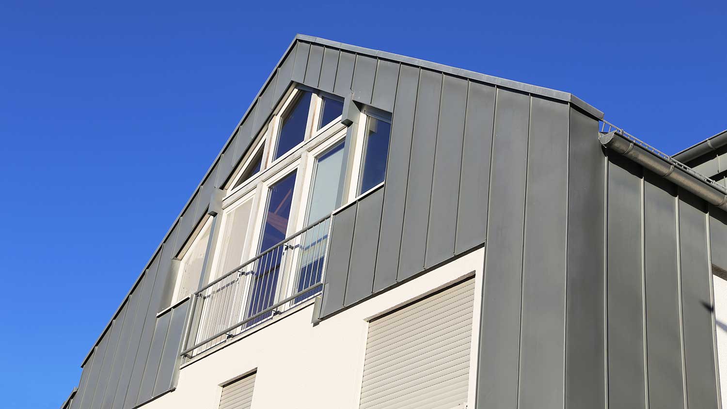 Detail of a modern house with metal siding