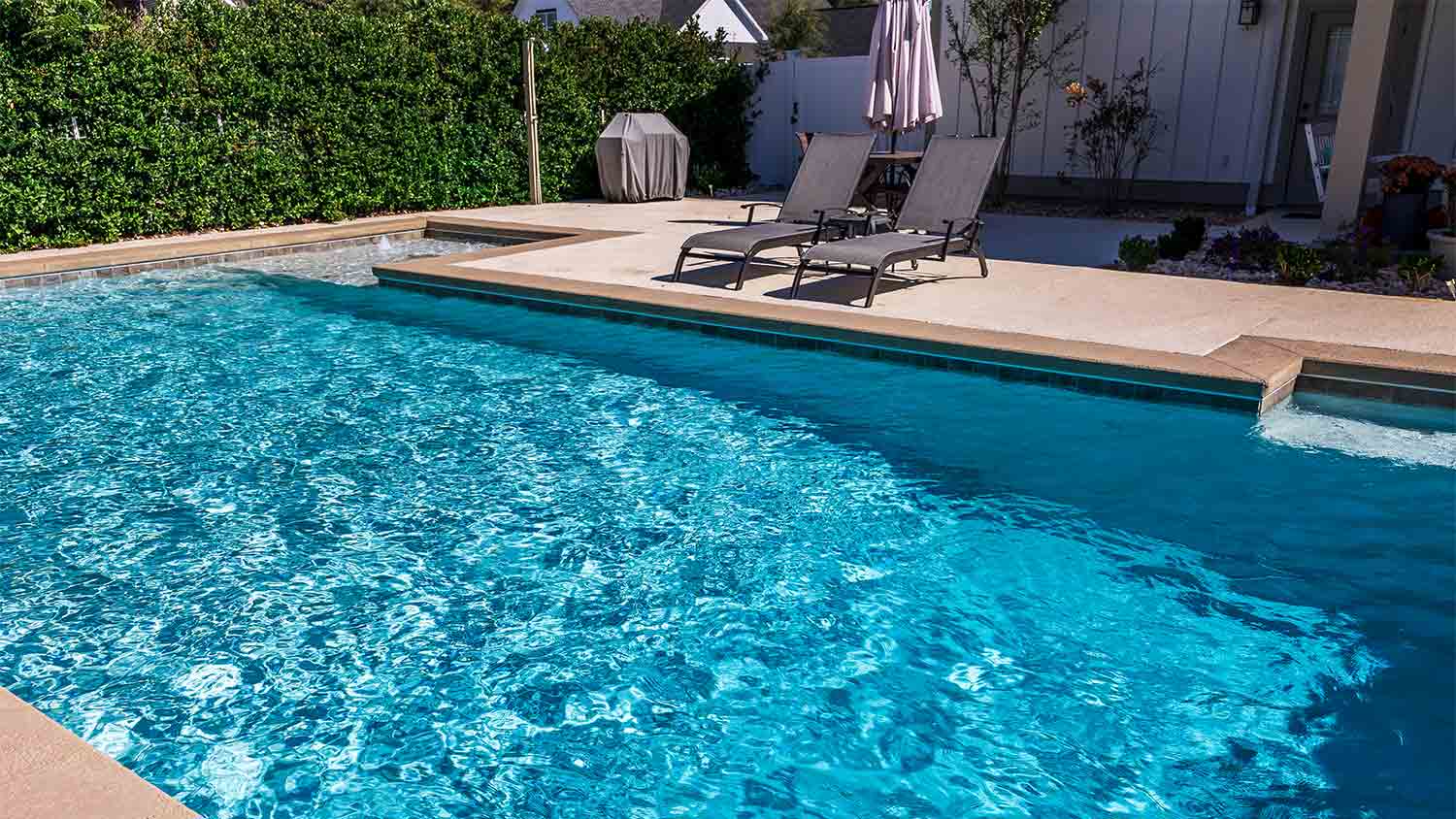 rectangle swimming pool in backyard