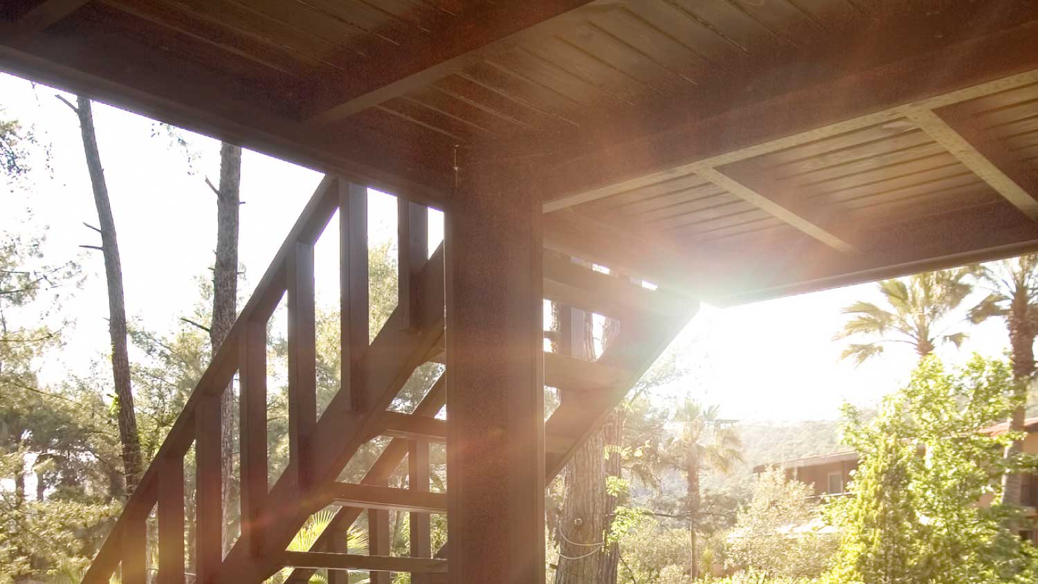 A wooden deck in backyard
