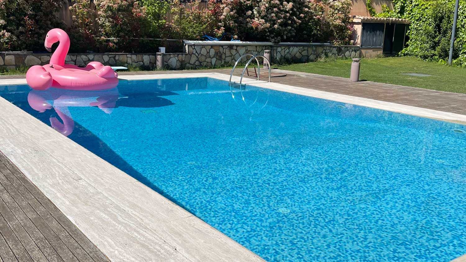 A swimming pool in home backyard